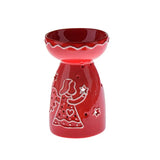 Kominek ceramiczny Czerwony Anioł, wysokość 15 cm